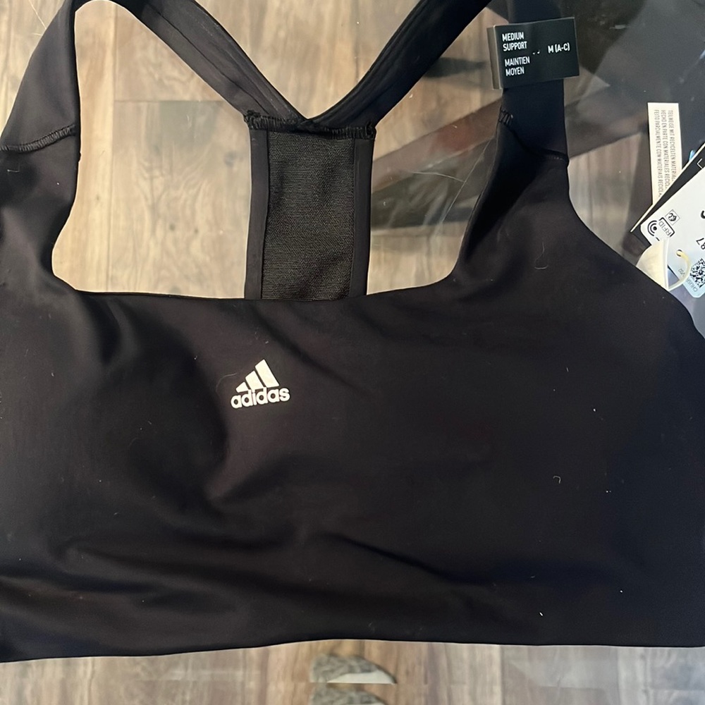 Adidas sports bra with tags. Never worn
